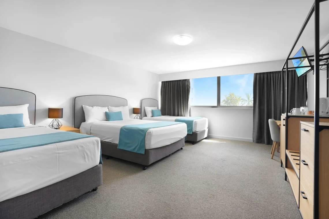 Family Room with one queen and two single beds