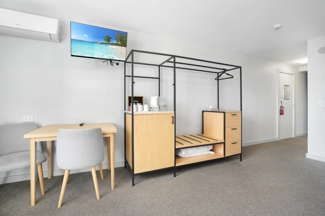 Standard Twin room with a queen bed and a single bed